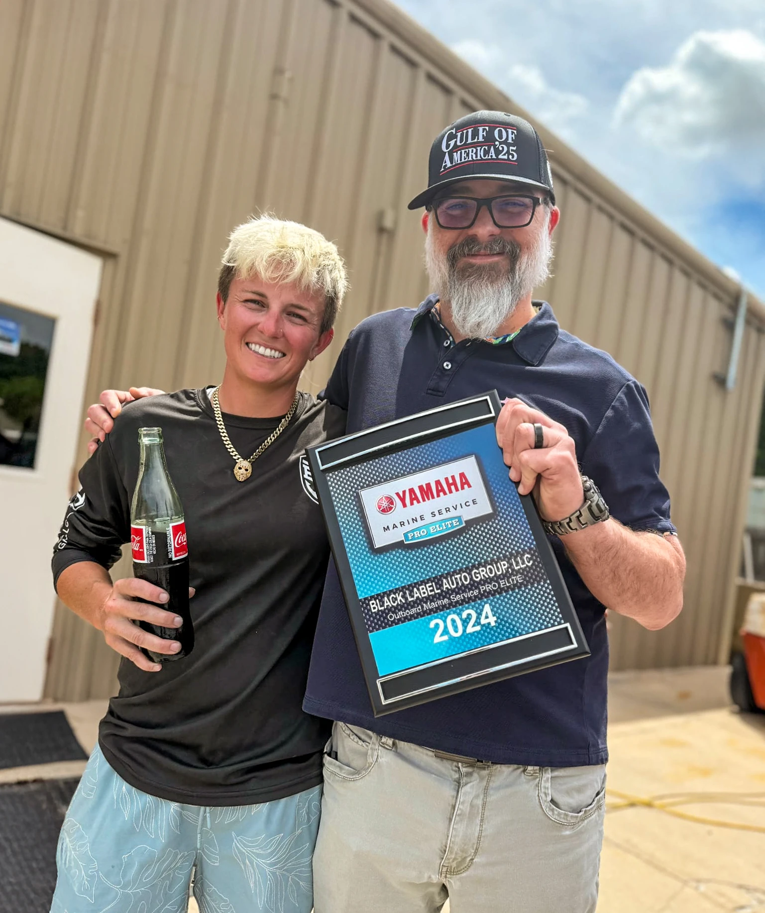 Professional marine technician servicing Yamaha outboard motor